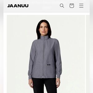 Jaanuu Ceri Essential 6-Pocket Scrub Jacket Limited Edition 
Like New